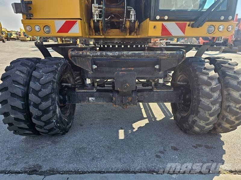 CAT M320F Kolová rýpadla