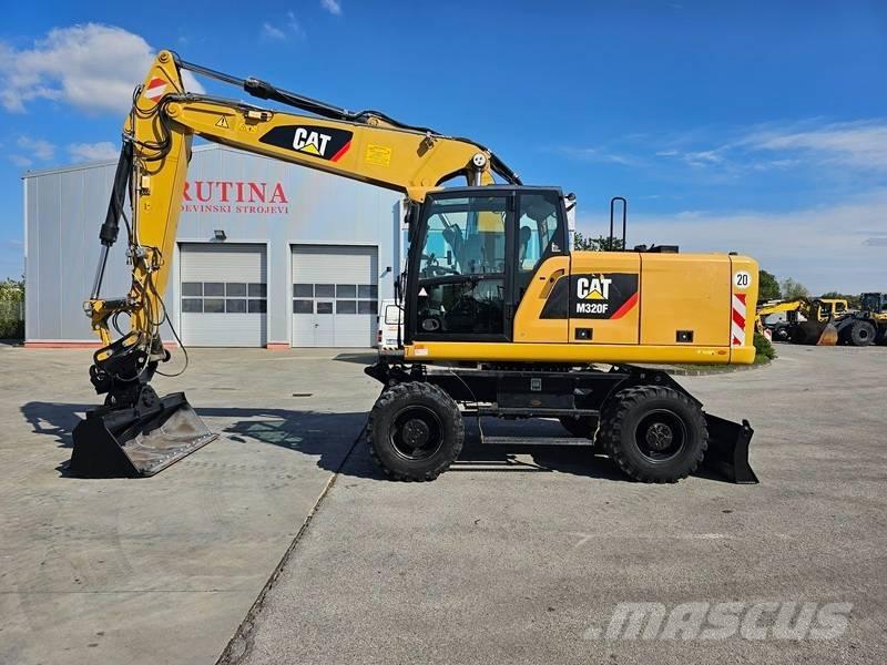 CAT M320F Kolová rýpadla