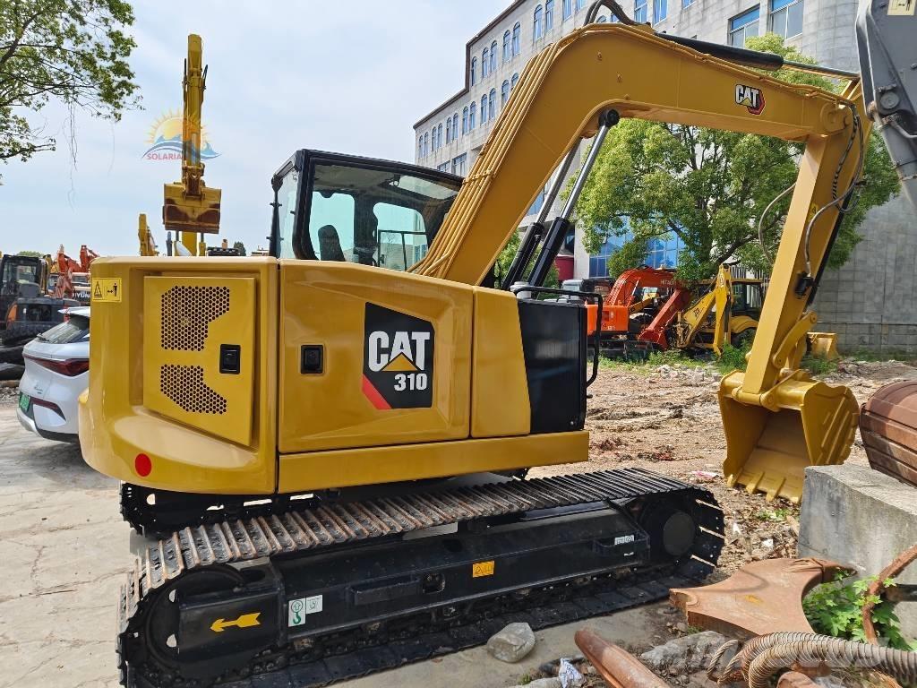 CAT 310 Pásová rýpadla