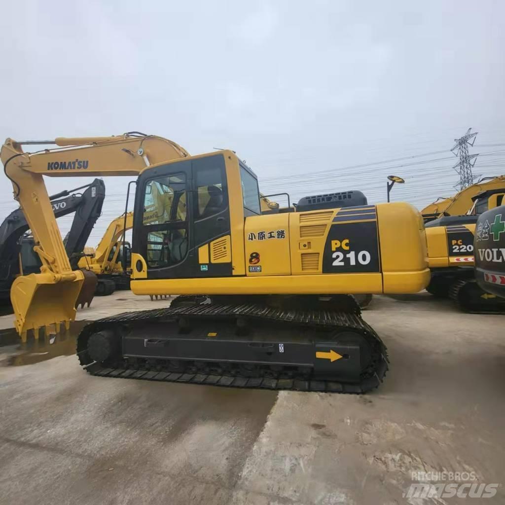 Komatsu PC 210 Pásová rýpadla