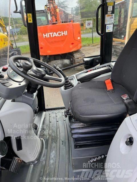 CAT 906 Kolové nakladače