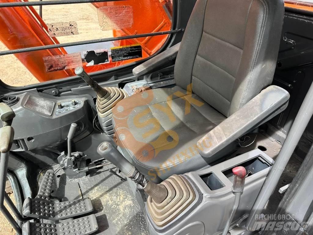 Hitachi EX 200 Pásová rýpadla