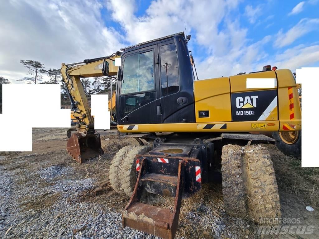 CAT M 315 D Kolová rýpadla