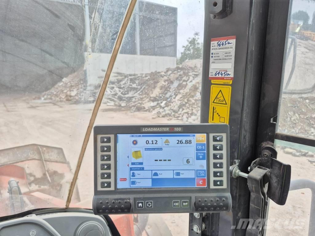 Hitachi ZW 250-6 Kolové nakladače