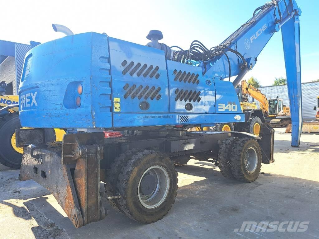 Fuchs MHL340D Stroje pro manipulaci s odpadem