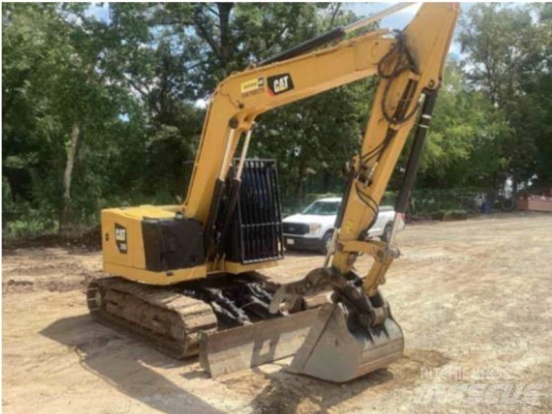 CAT 310 Pásová rýpadla