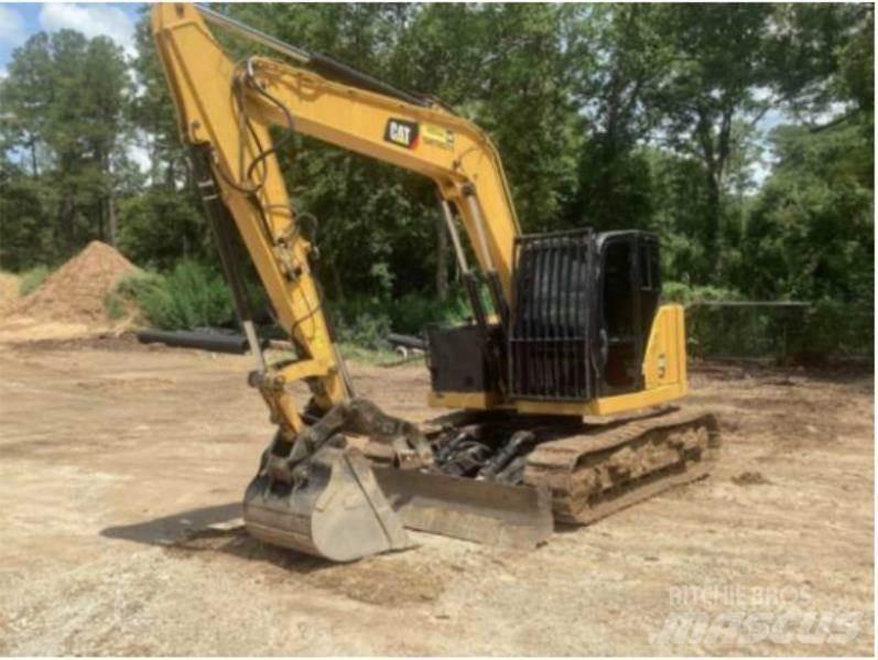 CAT 310 Pásová rýpadla