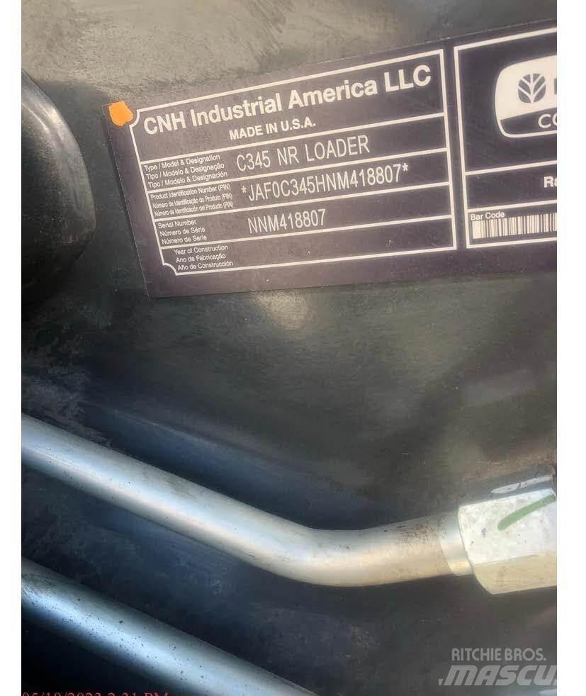 New Holland C345 Smykem řízené nakladače
