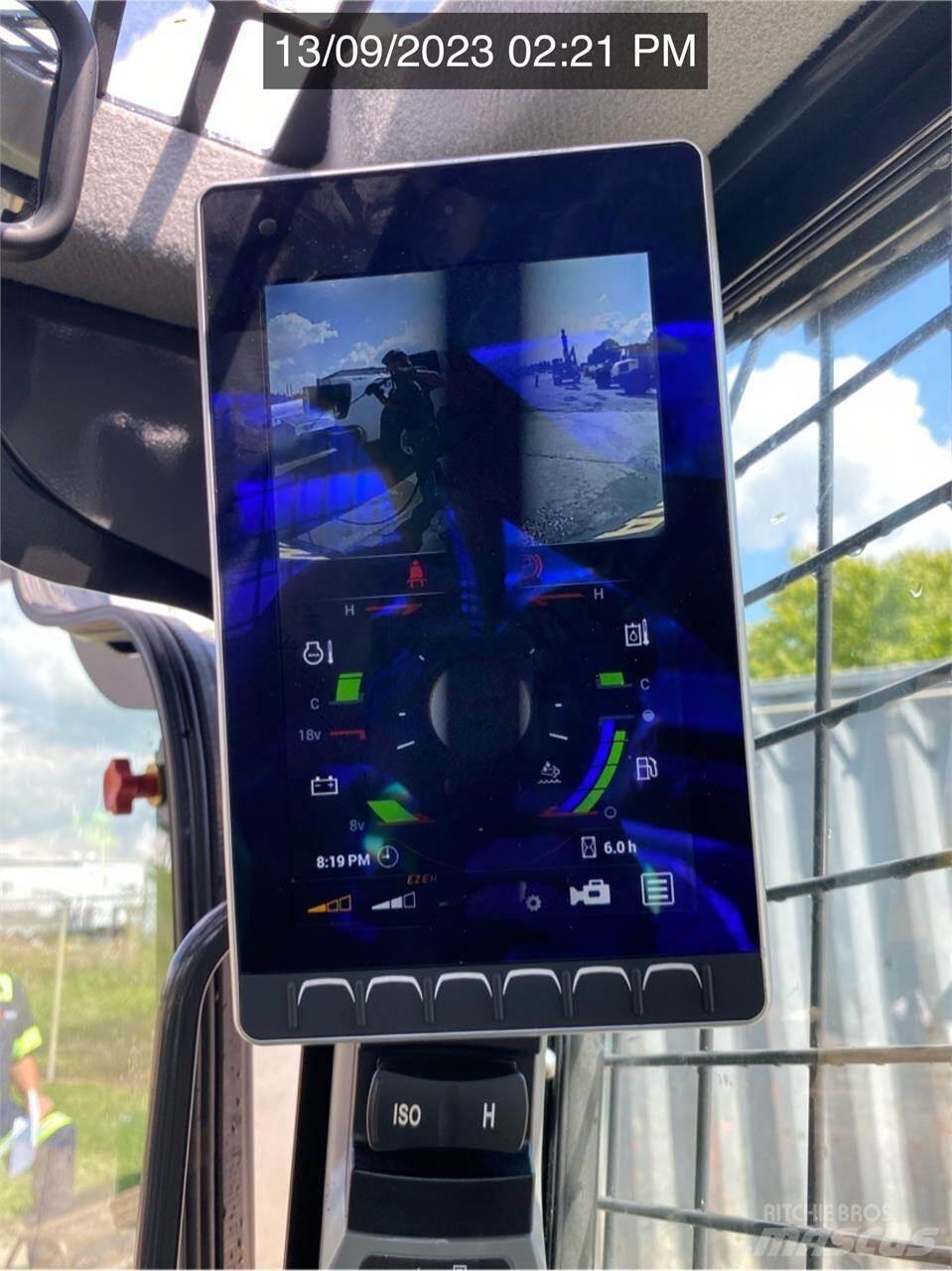 New Holland C345 Smykem řízené nakladače