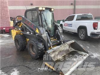 New Holland L228 Smykem řízené nakladače