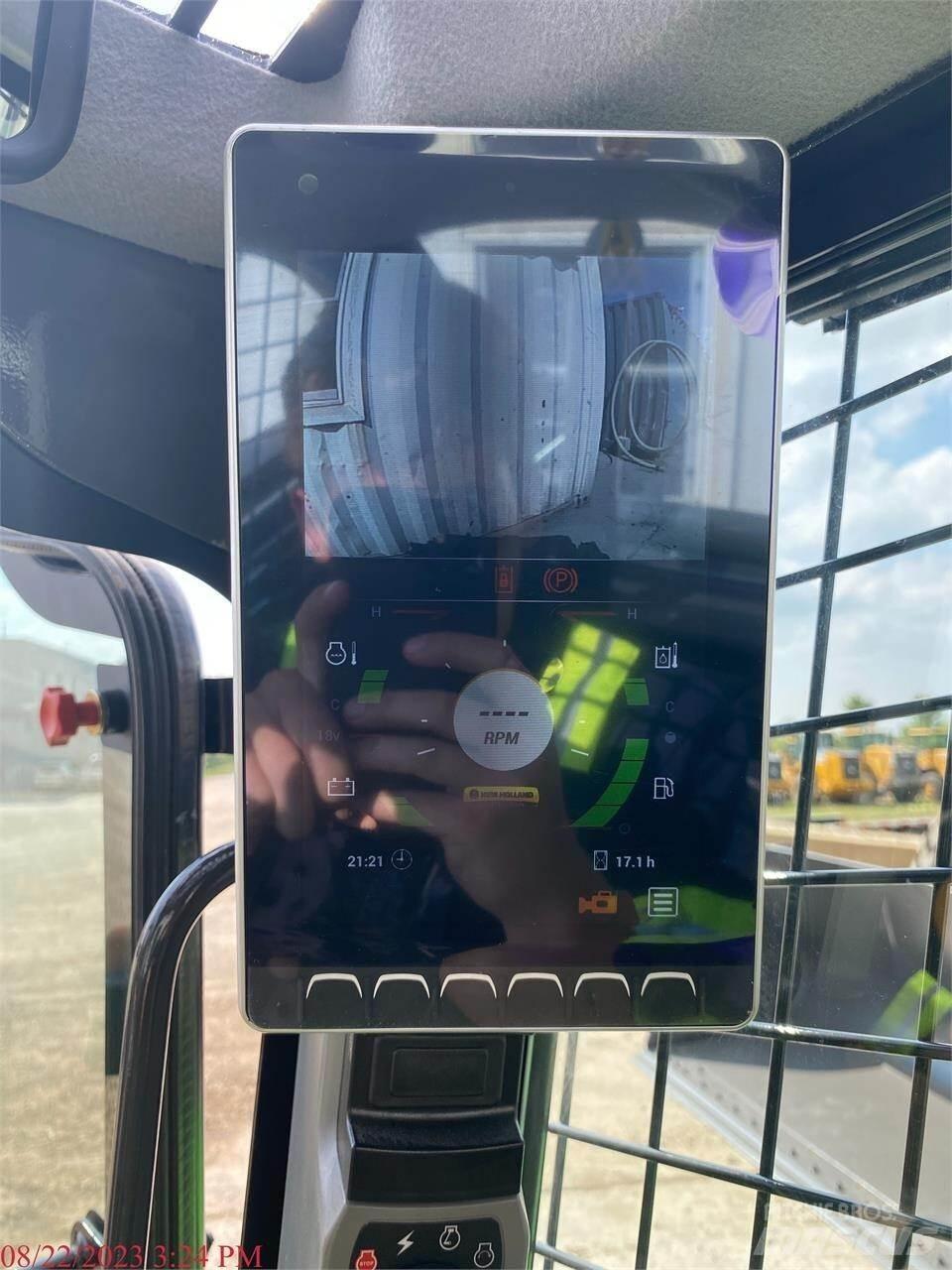 New Holland L328 Smykem řízené nakladače