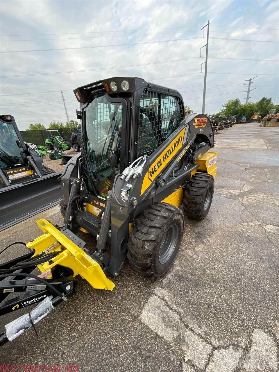 New Holland L328 Smykem řízené nakladače