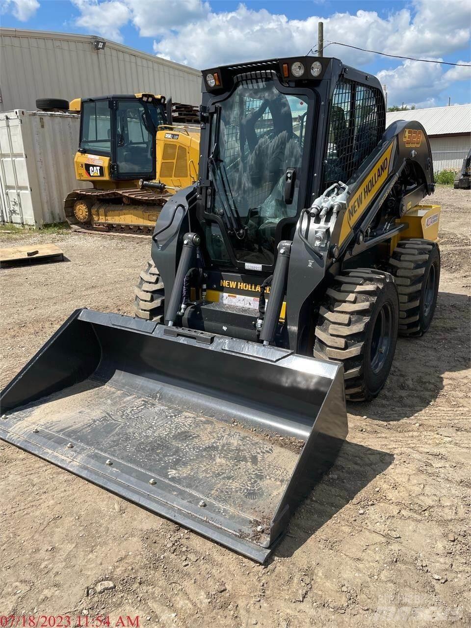 New Holland L328 Smykem řízené nakladače