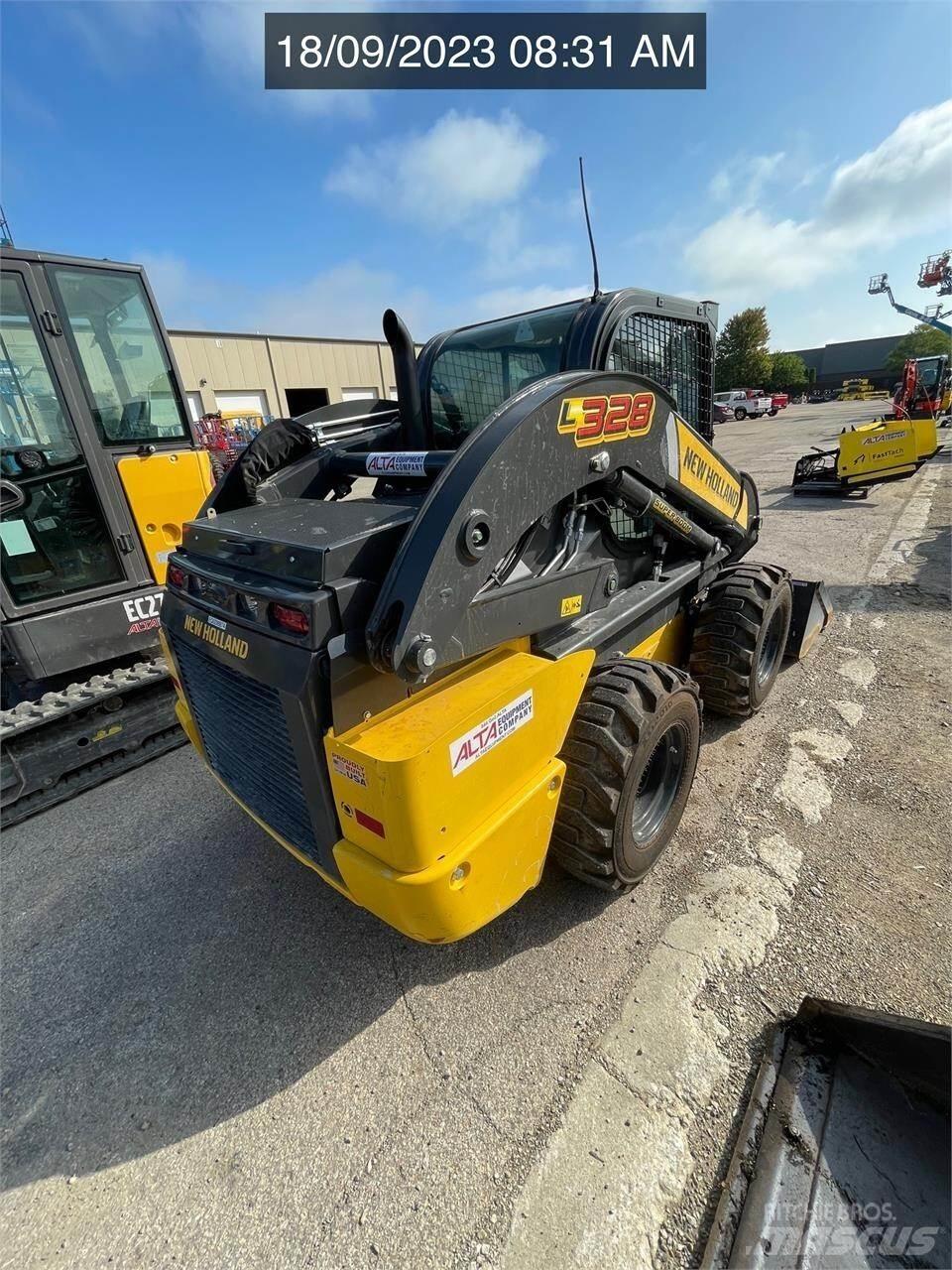 New Holland L328 Smykem řízené nakladače