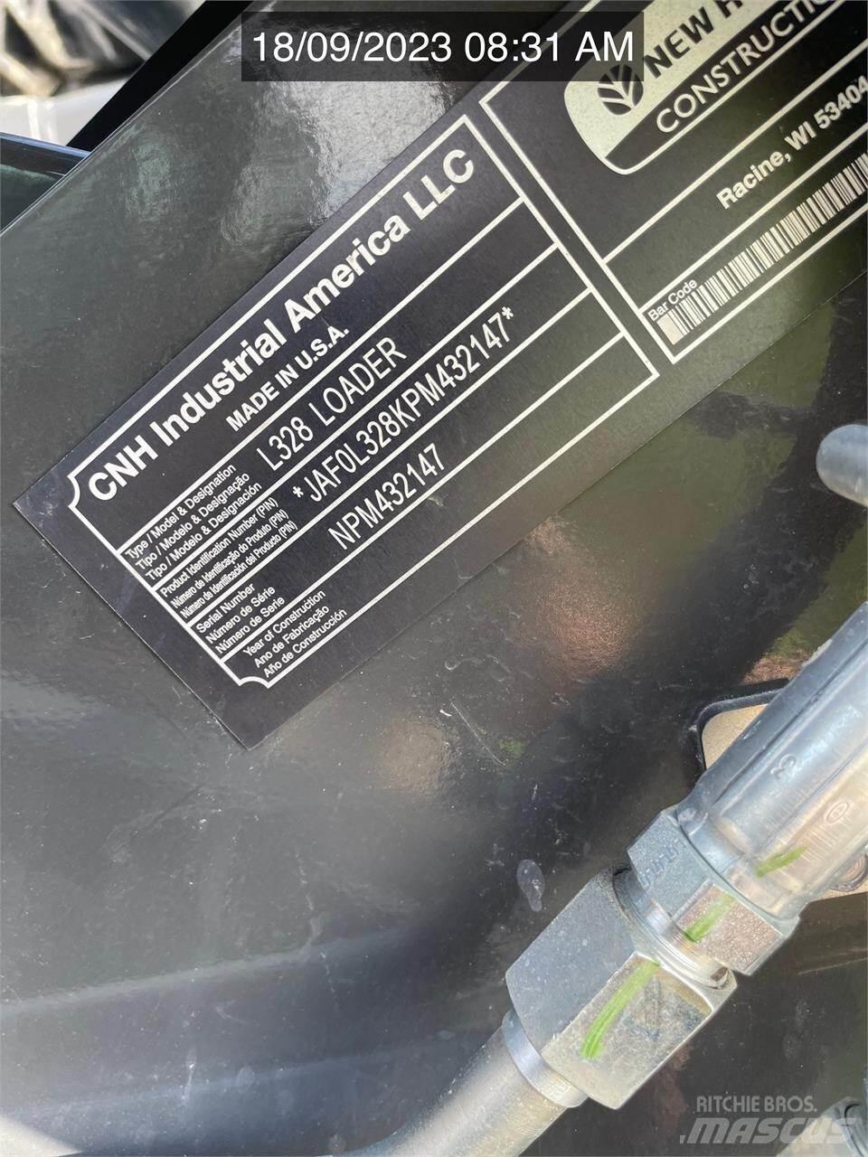 New Holland L328 Smykem řízené nakladače