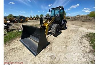 New Holland W80C Kolové nakladače