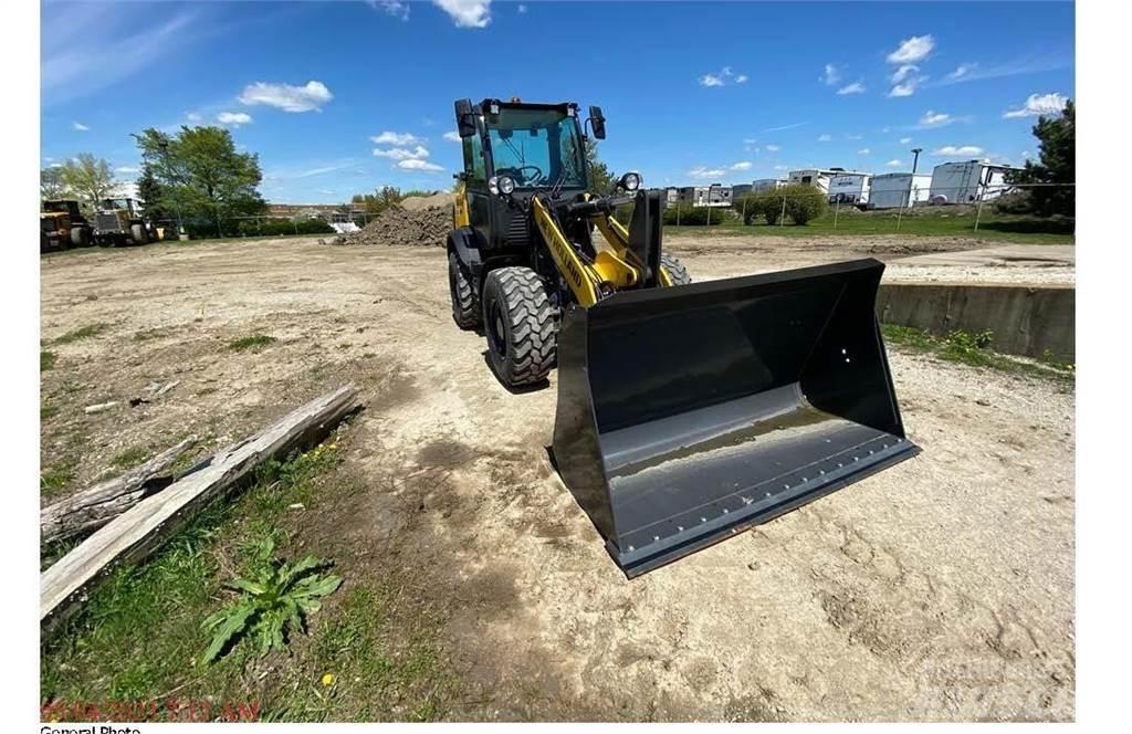 New Holland W80C Kolové nakladače