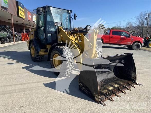 CAT 906M Kolové nakladače