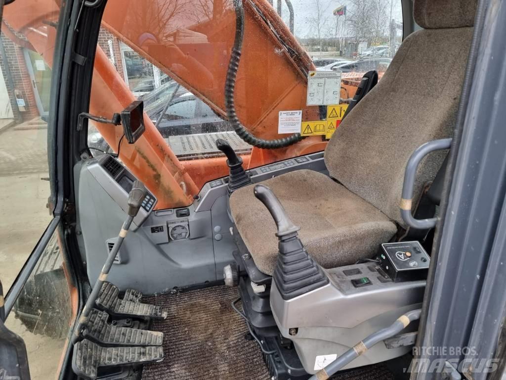 Doosan DX 225 LC Pásová rýpadla