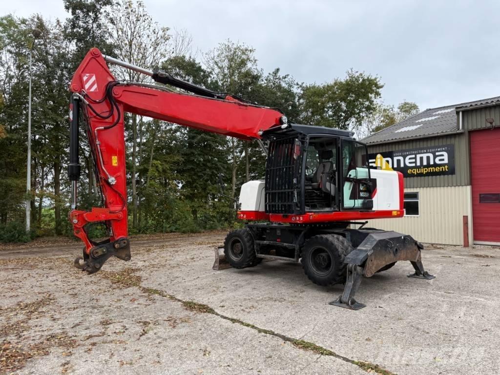 CAT M320F Kolová rýpadla