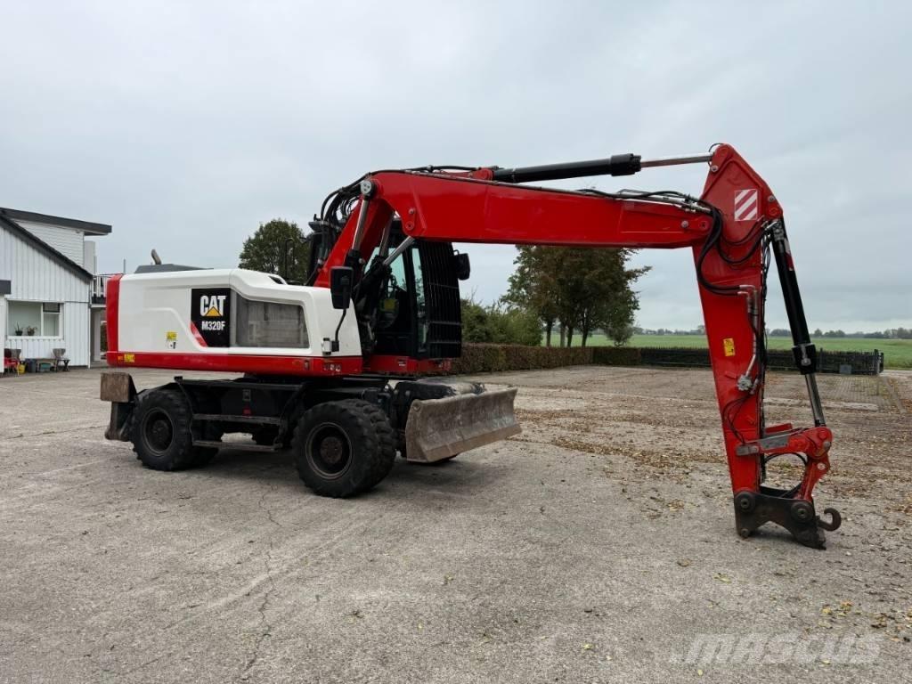 CAT M320F Kolová rýpadla