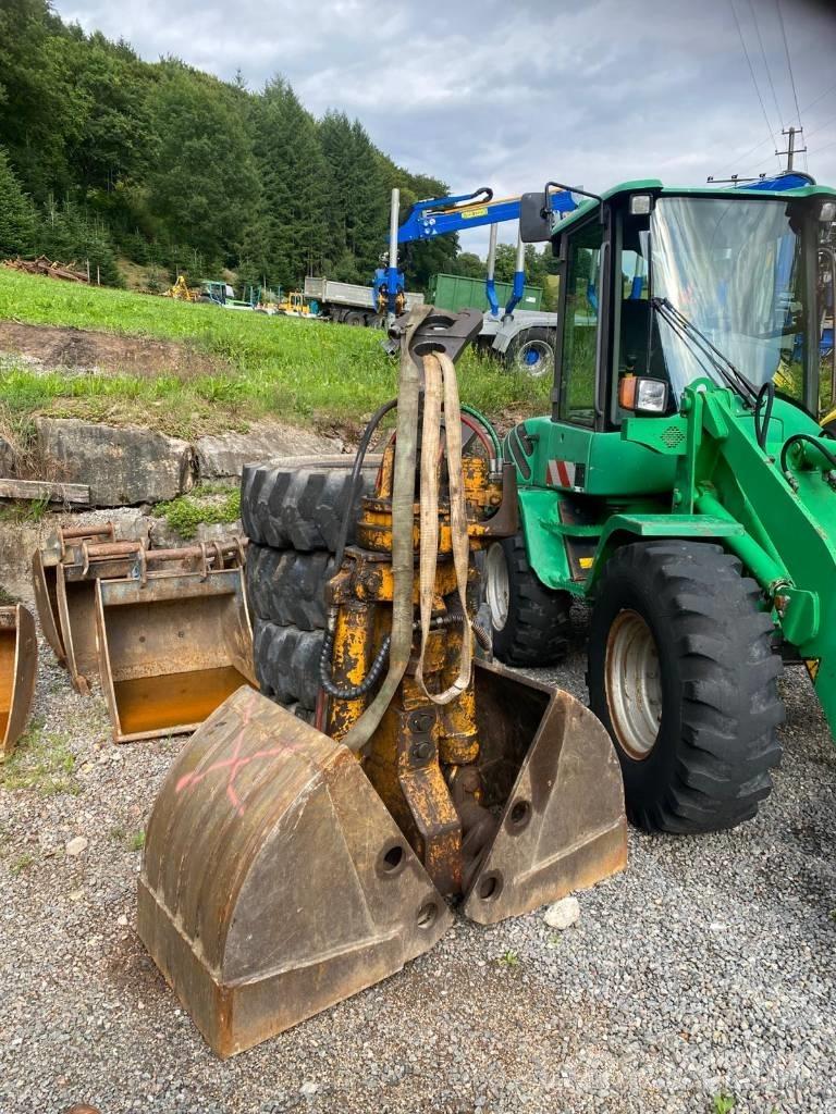 Hitachi ZX 140 W-3 Kolová rýpadla