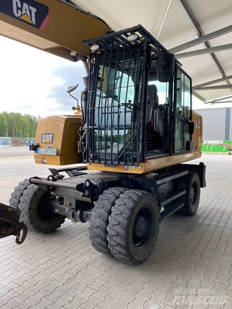 CAT M 320 F Kolová rýpadla