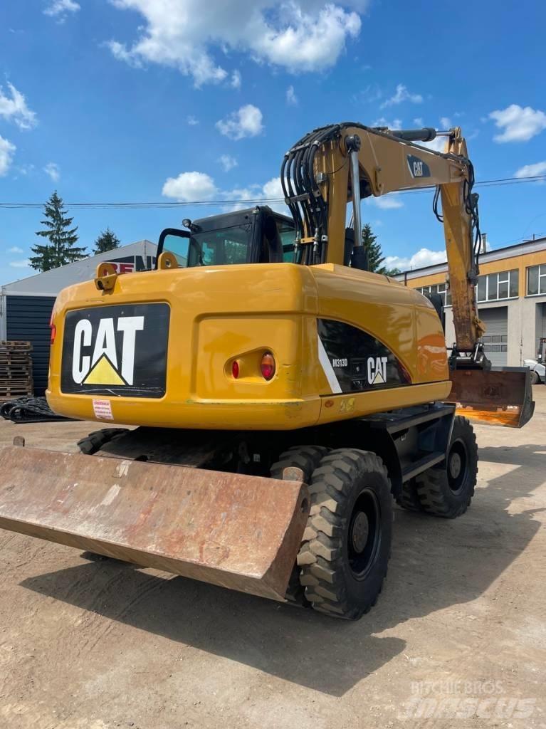 CAT M 313 D Kolová rýpadla