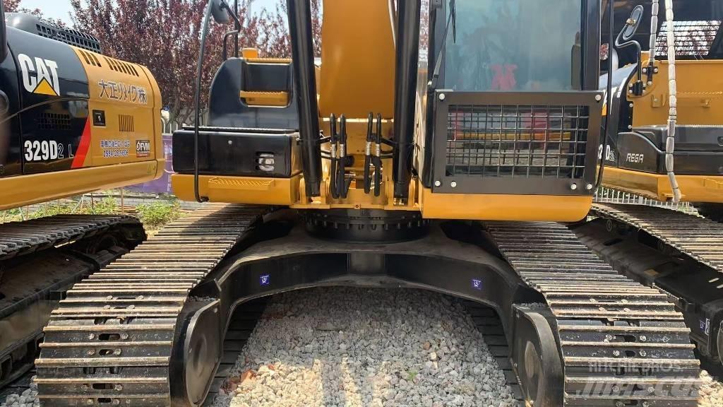 CAT 323 Pásová rýpadla