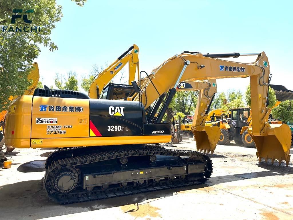CAT 329 Pásová rýpadla