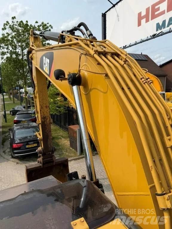 CAT 320DL Pásová rýpadla
