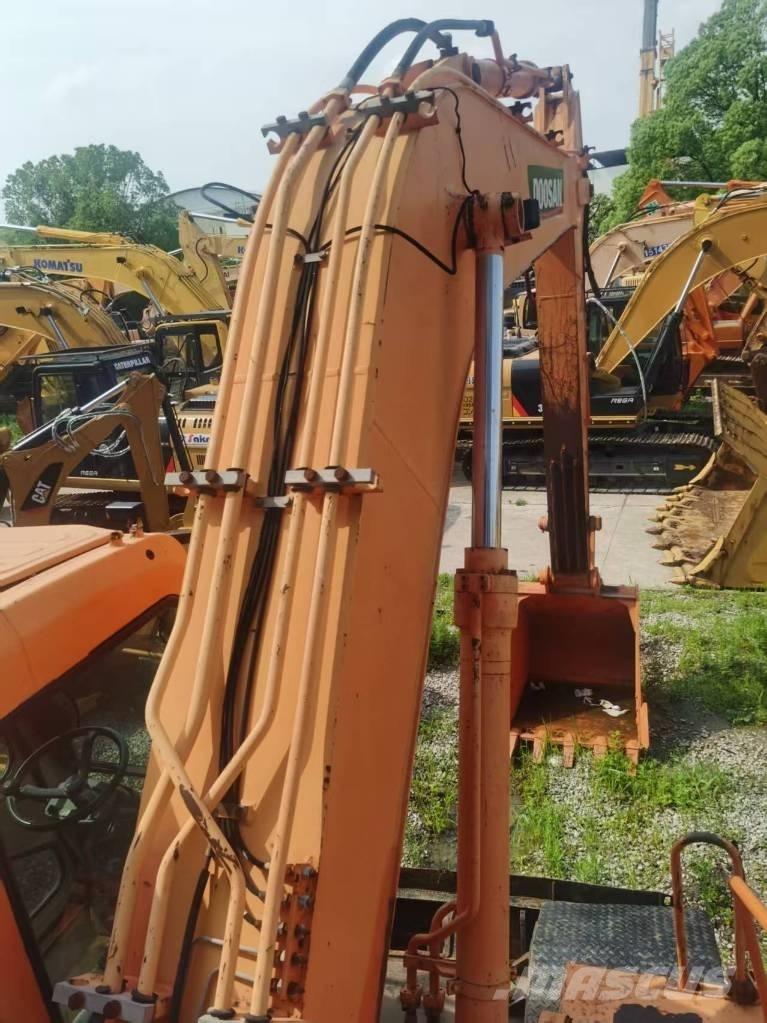 Doosan DH 210 W-7 Kolová rýpadla