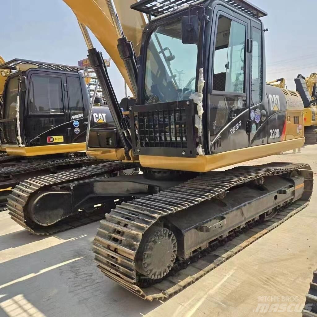 CAT 323 D Pásová rýpadla