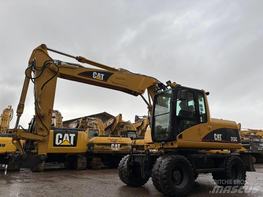 CAT M 313 C Kolová rýpadla