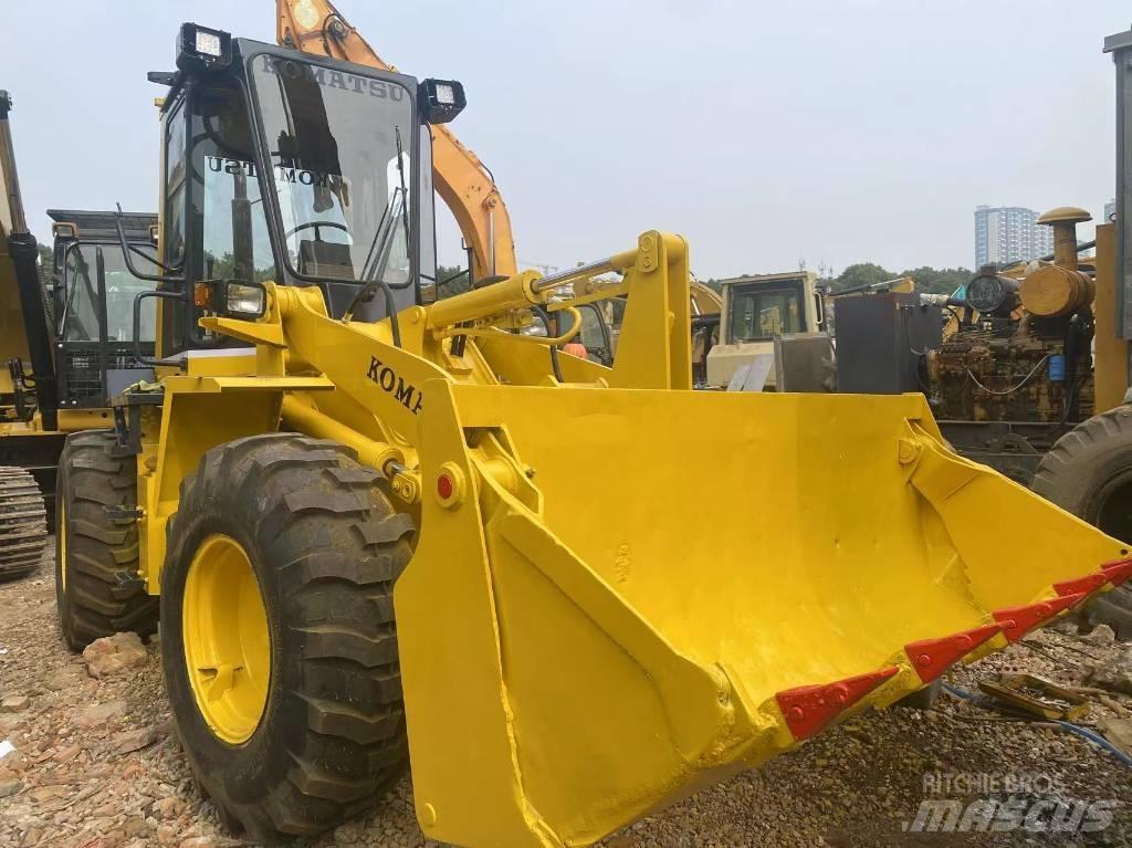 Komatsu WA100-1 Kolové nakladače