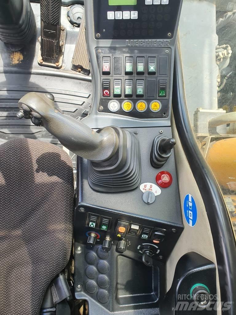 Liebherr A314 Kolová rýpadla