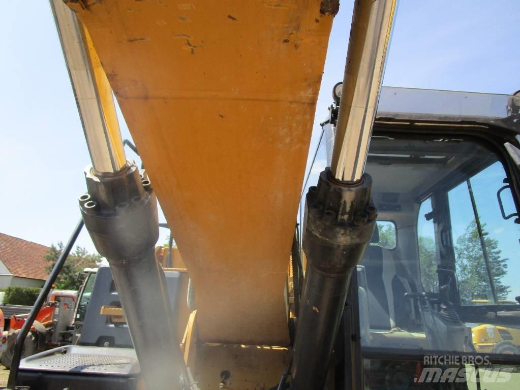 CAT 318 E L Pásová rýpadla
