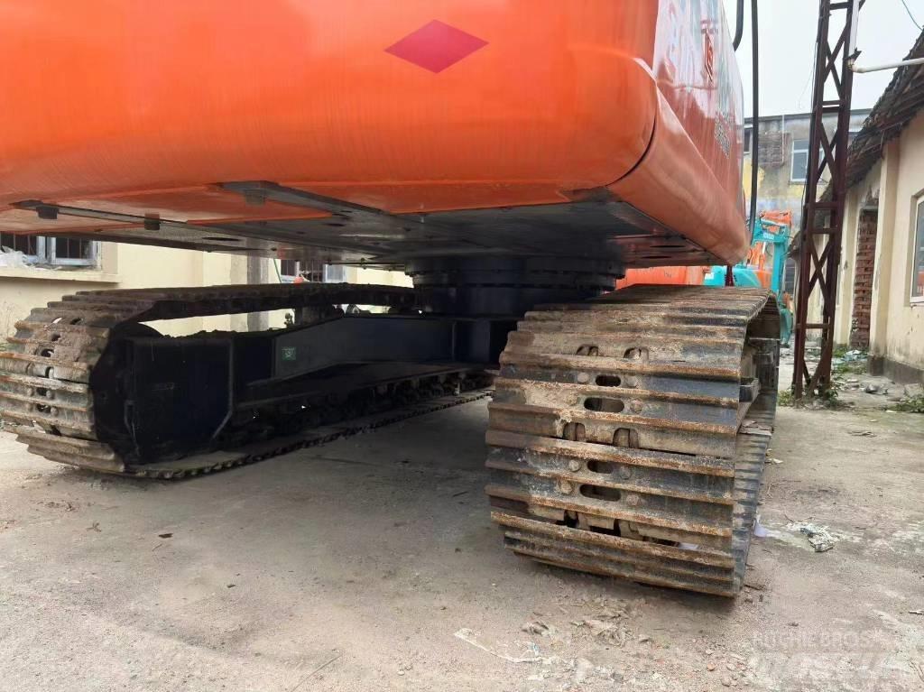 Hitachi ZX 210 Pásová rýpadla