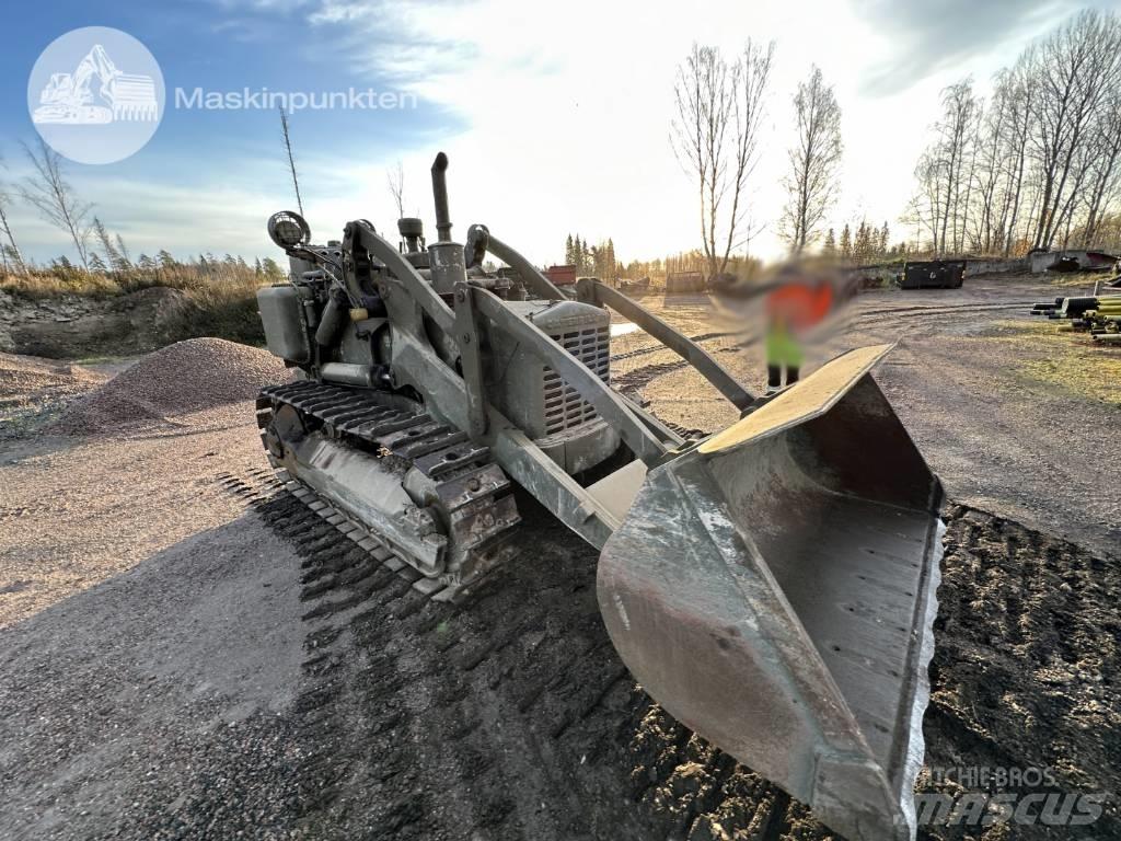 CAT 955 Pásové nakladače