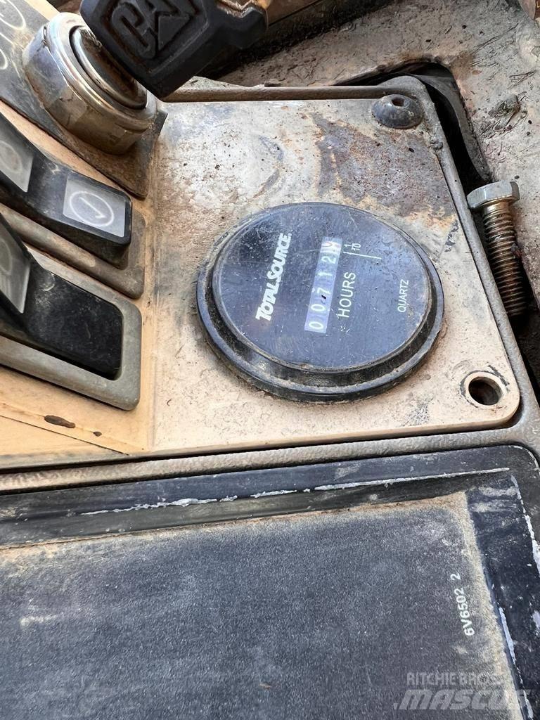 CAT 973 LGP Pásové nakladače