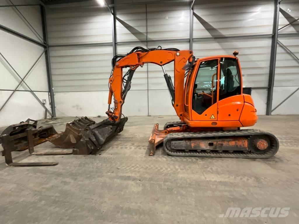 Mecalac 10 MCR Pásová rýpadla