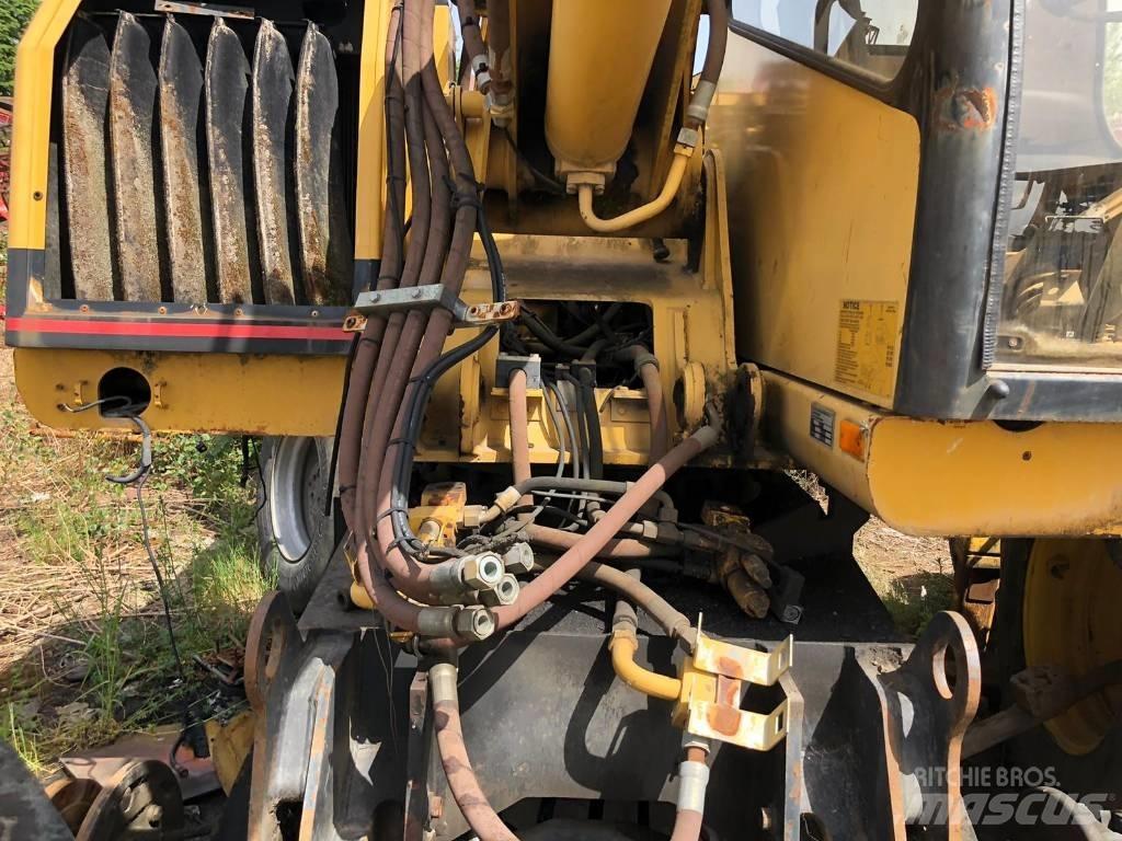 CAT M 312 FOR PARTS Kolová rýpadla