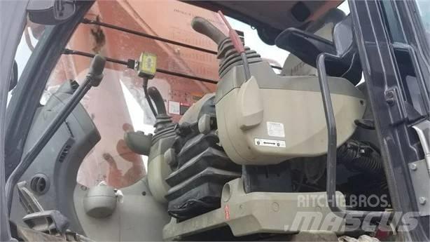 Hitachi ZX 670 Pásová rýpadla