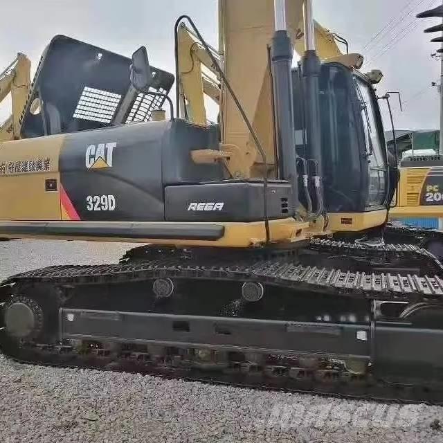 CAT 329 Pásová rýpadla