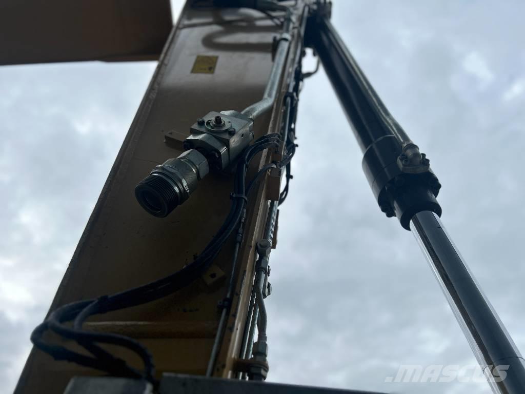 CAT M318F Kolová rýpadla