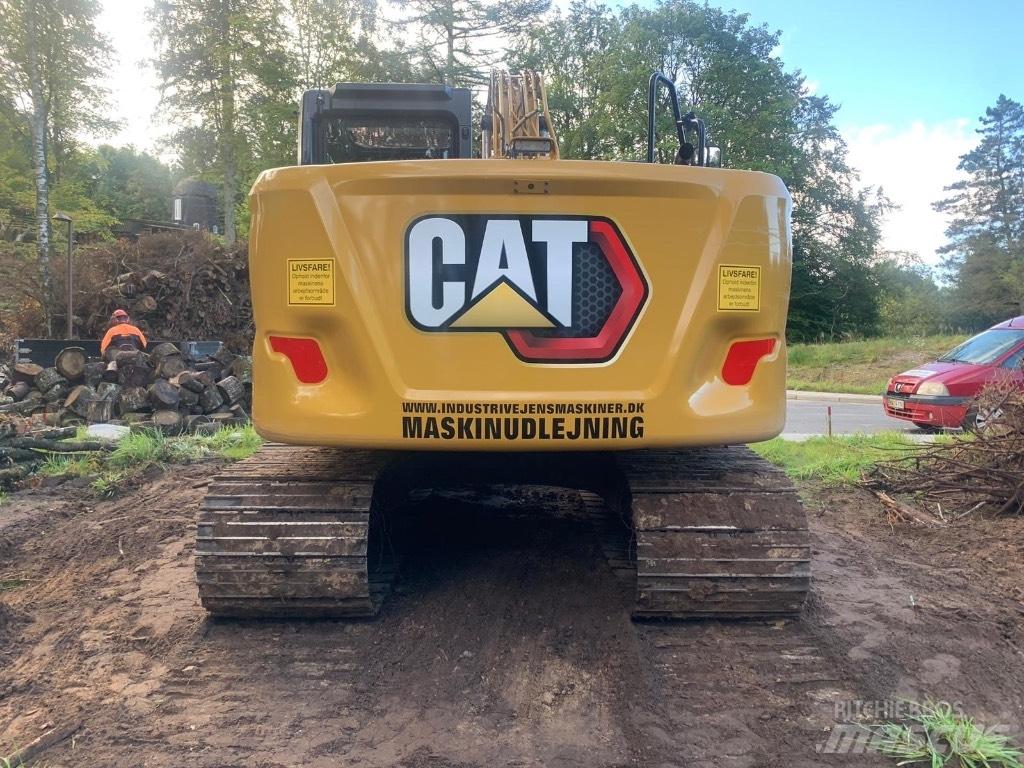 CAT 313 Pásová rýpadla