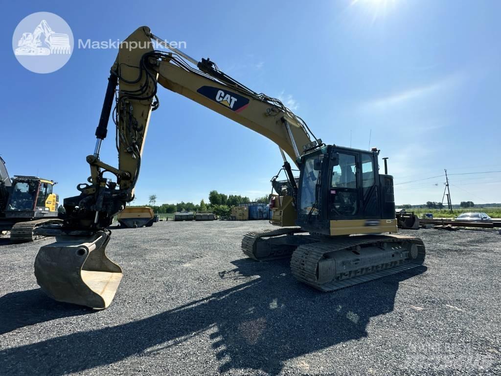 CAT 325 FL CR Pásová rýpadla