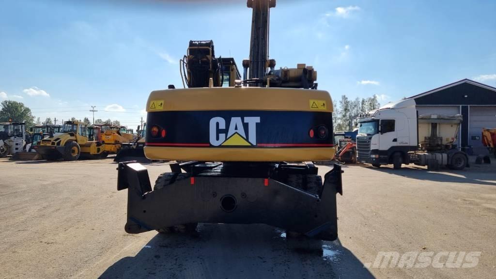 CAT M 322 C MH Stroje pro manipulaci s odpadem