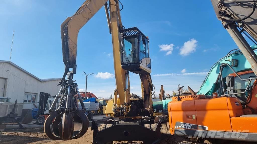 CAT M 322 C MH Stroje pro manipulaci s odpadem