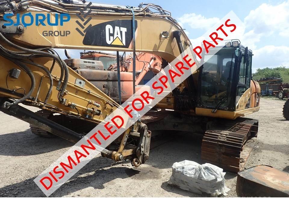 CAT 323D Traktory